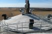 Concrete conical roof, allowing for almost complete use of silo walls.